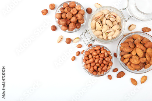 Set of different nuts on a light background.  © White bear studio 