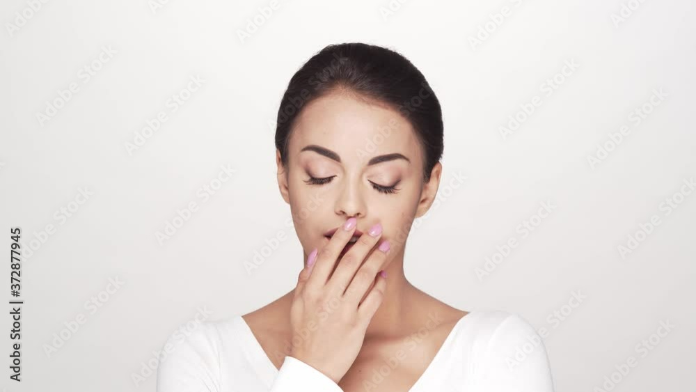 Studio portrait of young and beautiful brunette woman Studio portrait of young and beautiful brunette woman