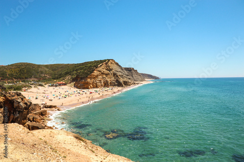 Amazing Sandy beach with Crystal clear water with blue sky in background in a summer day. 