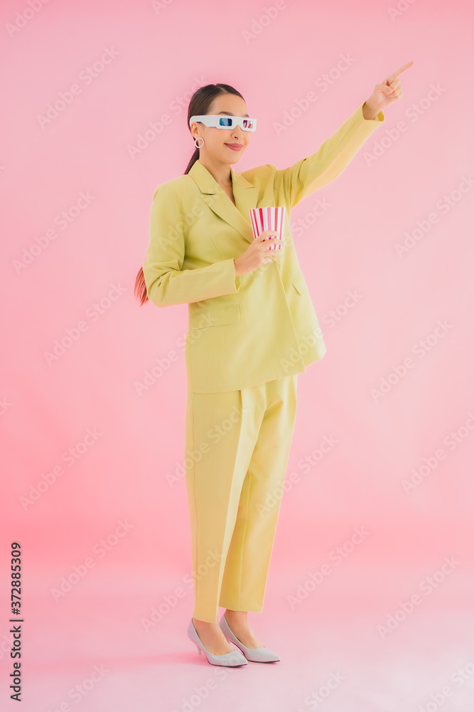 Portrait beautiful young asian woman with 3d eyeglasses and popcorn Portrait beautiful young asian woman with 3d eyeglasses and popcorn