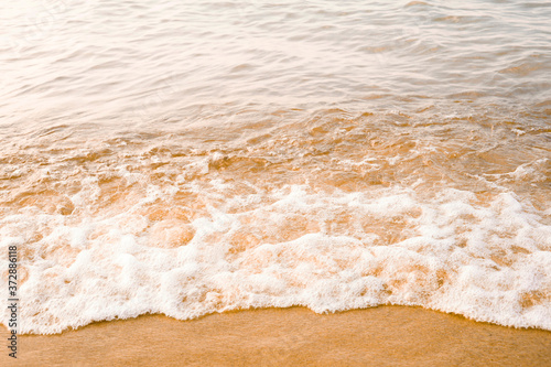 The concept of travel and rest at the seaside  sea waves on the background of the shoreline