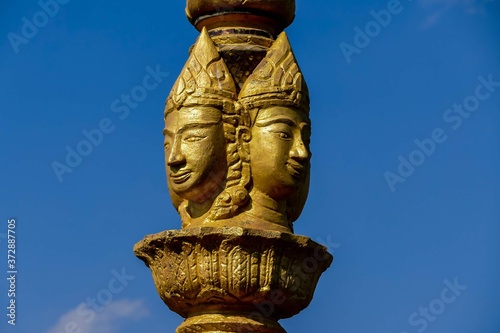 Photography statue in temple, digital photo picture as a background , taken in Patuxai laos,