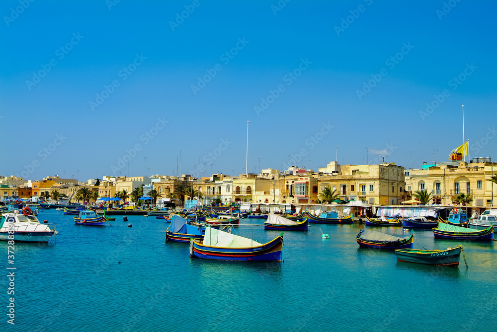 Malta : Some Maltese Traditional Small Fishing Boats In Marsaxlokk Sea, Malta