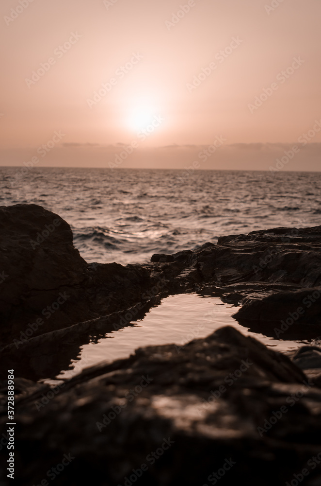 nature poster. sunset at the ocean and reflection