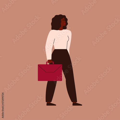 Confident African businesswoman stands with a red briefcase. A strong black female entrepreneur looks ahead confidently. Vector. Concept of equitable participation of women in politics and business.