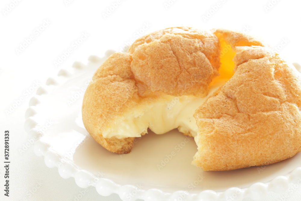 Japanese style confectionery, puff cream on dish for gourmet dessert Japanese style confectionery, puff cream on dish for gourmet dessert