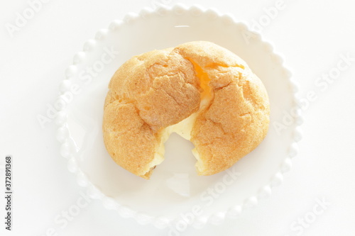 Japanese style confectionery, puff cream on dish for gourmet dessert