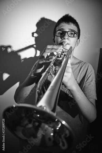 young man playing the trumpet