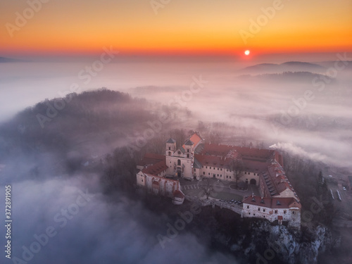 Drone aerial photo of Tyniec Abbey in mist near Krakow in Malopolska  Poland 