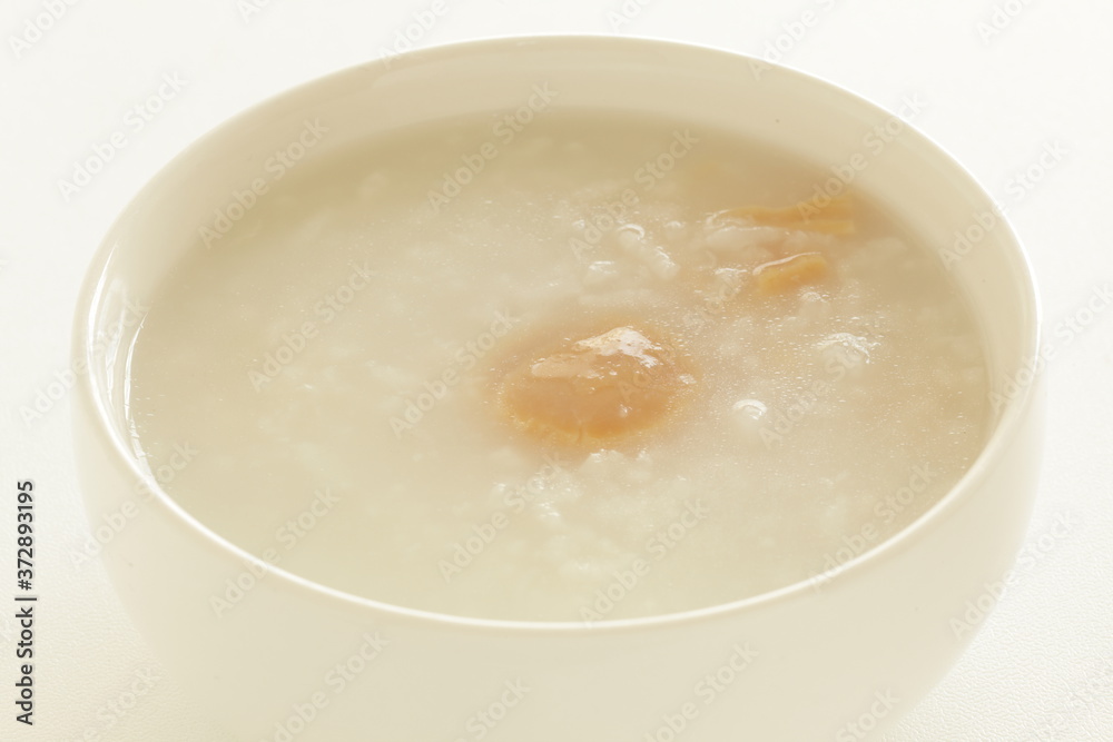 Chinese food, dried scallop in rice porridge for healthy gourmet congee Chinese food, dried scallop in rice porridge for healthy gourmet congee
