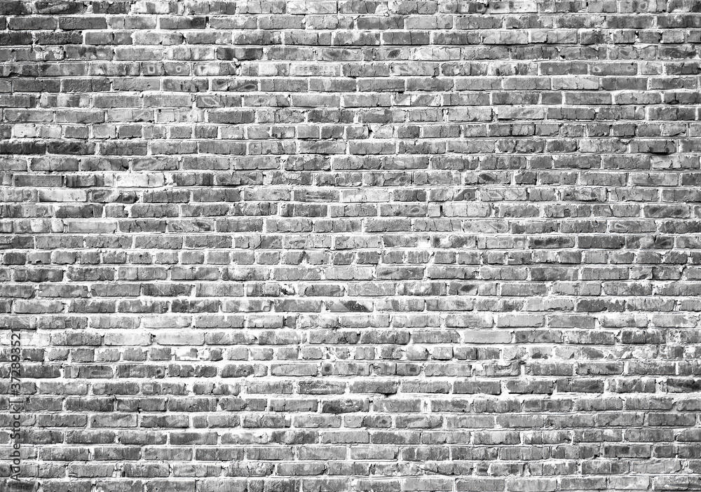 Grunge black and white brick wall background. Empty texture
