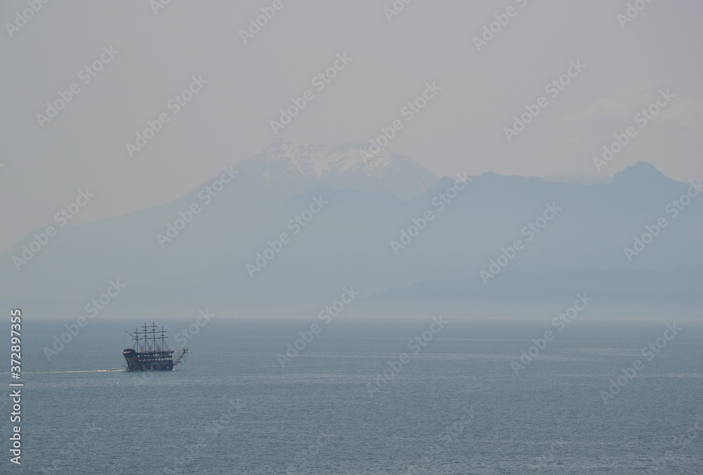 Big ship is traveling at calm Mediterranean Sea Turkey