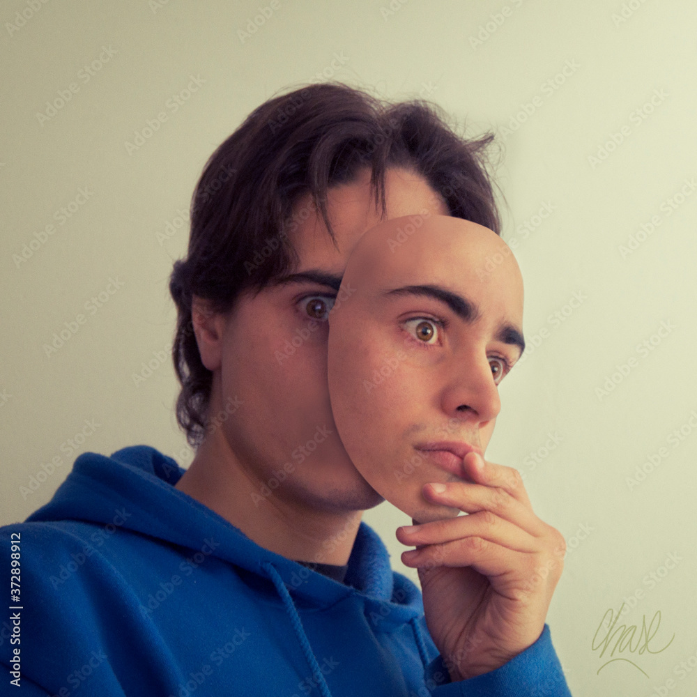 Εκτύπωση καμβά Man holding a mask with his face