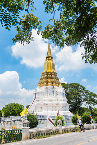Ayutthaya, Thailand - June, 22, 2020 : Golden Pagoda on a sunny blue sky on summer day named Phra Chedi Sri Suriyothai famous and major tourist attraction religious in Ayutthaya, Thailand