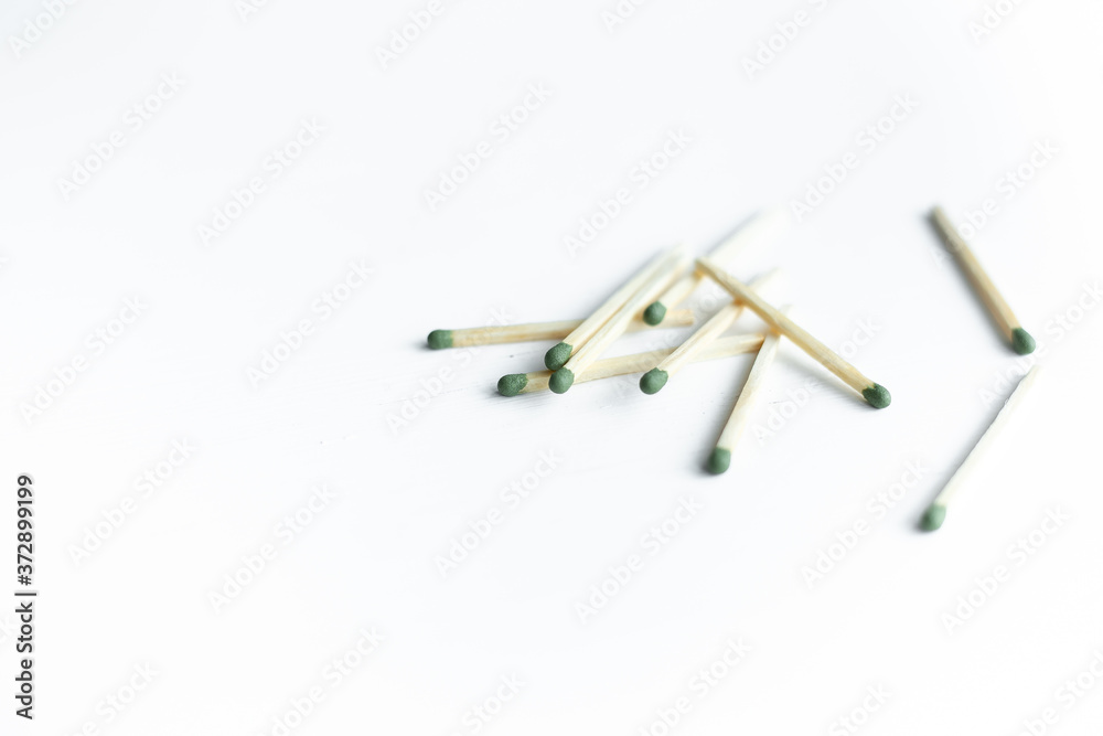 wooden matches on white background.Place for text wooden matches on white background.Place for text