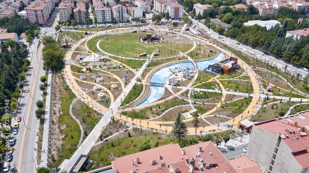 Aerial view of the open field playground and park at the city center. There is a walking path, cafeteria and pool. Eskisehir/Turkey