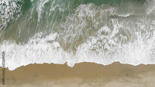 Drone Footage of Ocean waves in a small Indian Village  photo