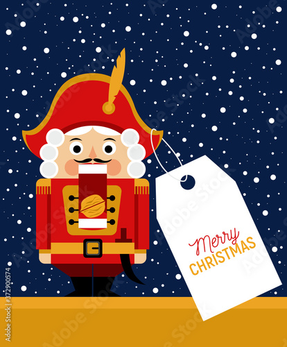 Christmas greeting card with nutcracker in the showcase of the toy shop