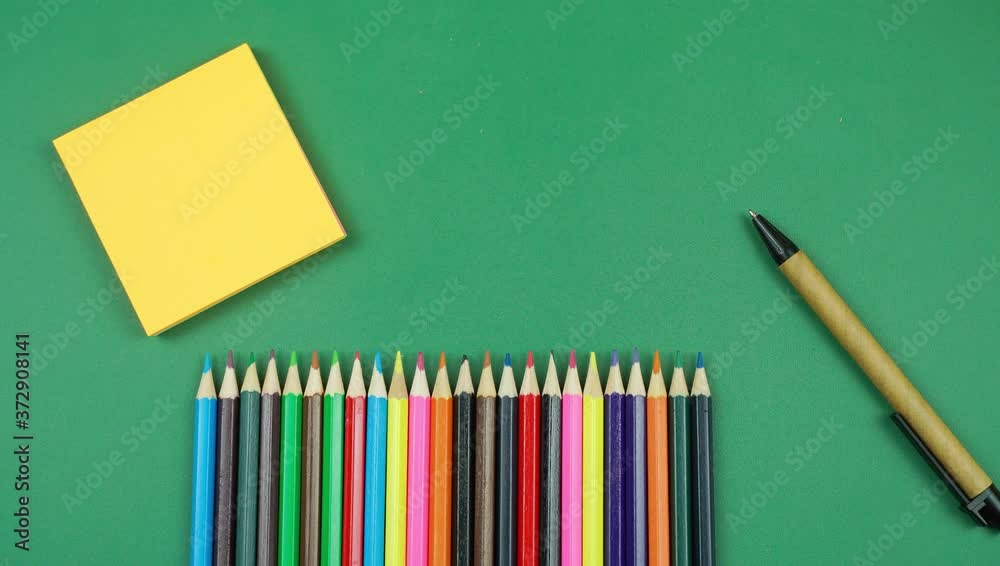 Colored pencils animation 4K screen movement on a green background ...