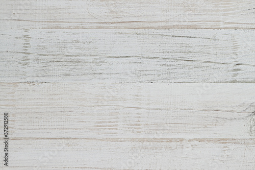 Shabby white color painted wooden surface background or wallpaper