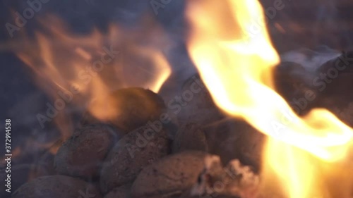 Fire, garden hearth, burrning in slow motion, outdoor in the winter
 photo