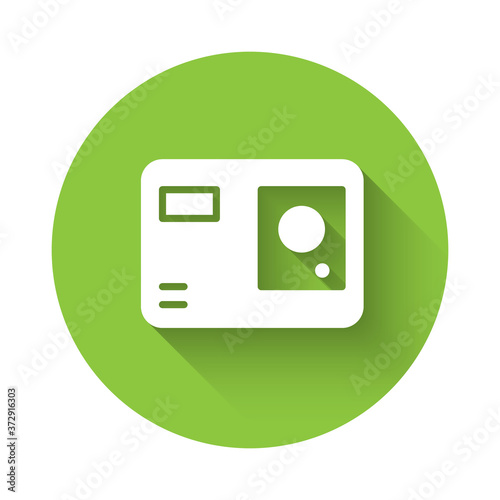 White Action extreme camera icon isolated with long shadow. Video camera equipment for filming extreme sports. Green circle button. Vector Illustration.
