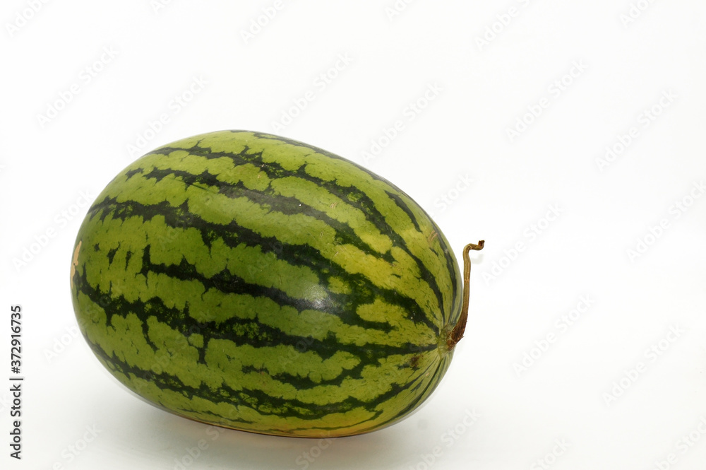 Wassermelone Frucht am Stück auf neutralem Hintergrund Wassermelone Frucht am Stück auf neutralem Hintergrund