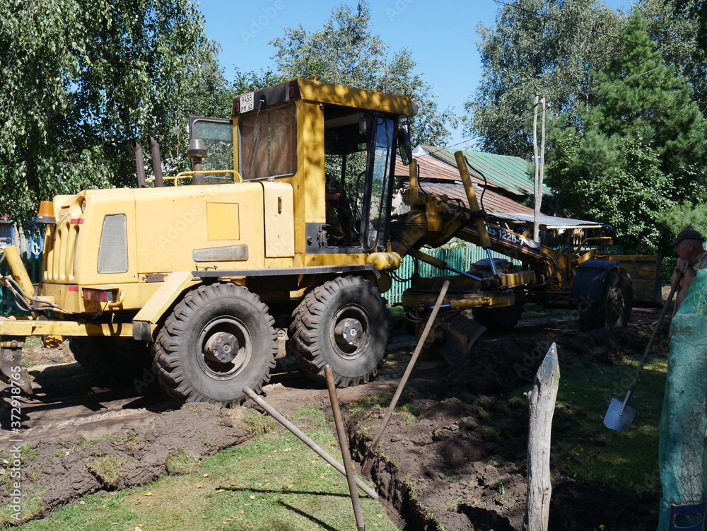 construction work to repair the road. In the village. Dug-up road construction work to repair the road. In the village. Dug-up road