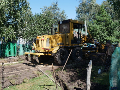 construction work to repair the road. In the village. Dug-up road