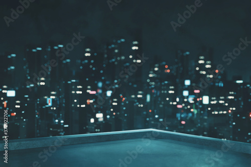 3D Rendering of roof top building with view of futuristic cyber punk city at night. Sky scrapper towers with blur glowing advertising signs. For business technology product background, wallpaper
