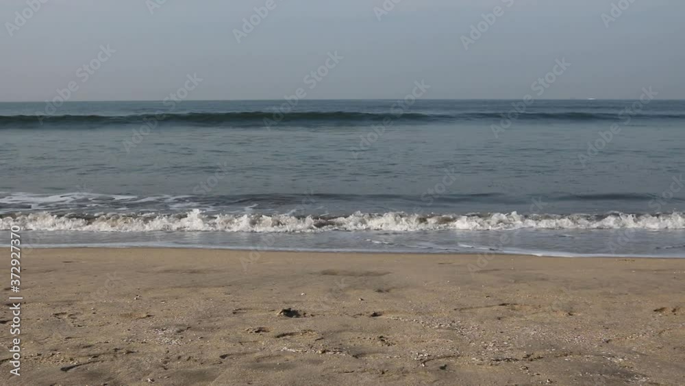 Ocean and low tide sandy beach. Ocean and low tide sandy beach.