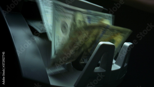 Equipment for calculation currency. Dollar bills in currency counting machine