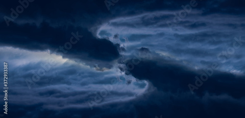 Parallel dramatic storm clouds space