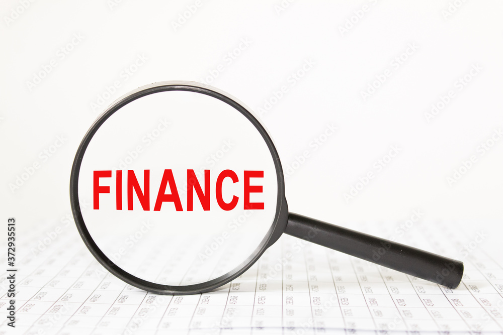 words in a magnifying glass on a white background. business concept words in a magnifying glass on a white background. business concept