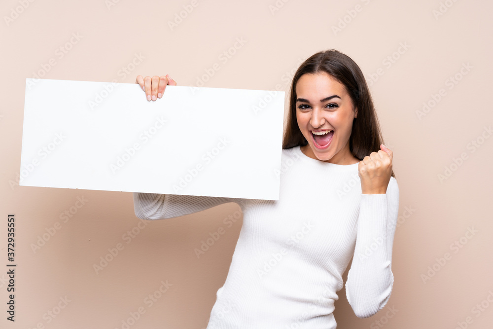 Young woman over isolated background holding an empty white placard for insert a concept Young woman over isolated background holding an empty white placard for insert a concept