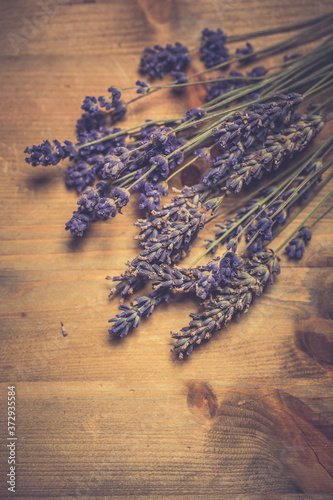 Bunch of lavender on wooden table. Vintage style