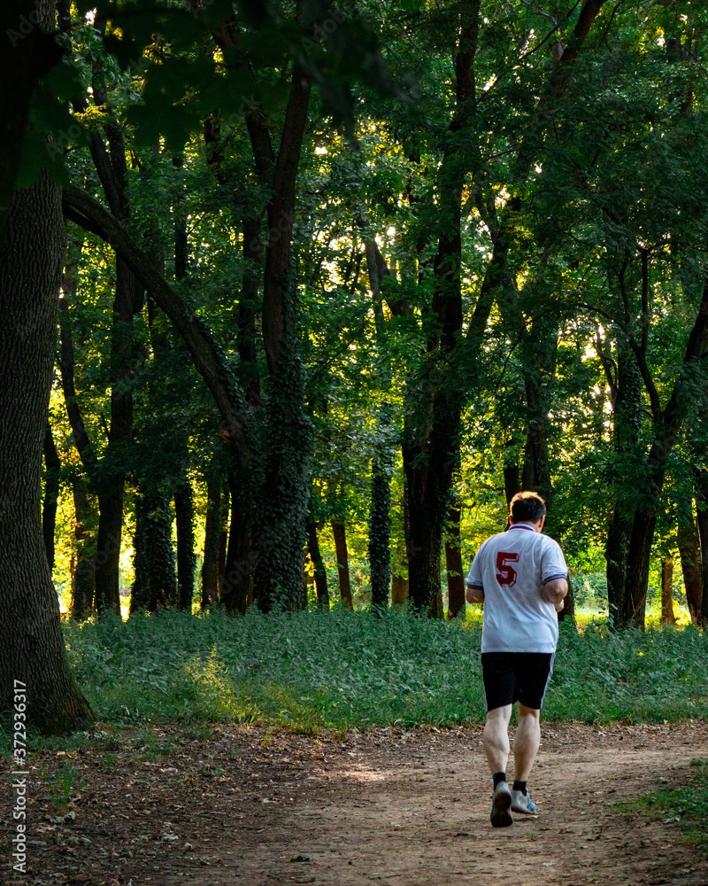 Man running in the forest