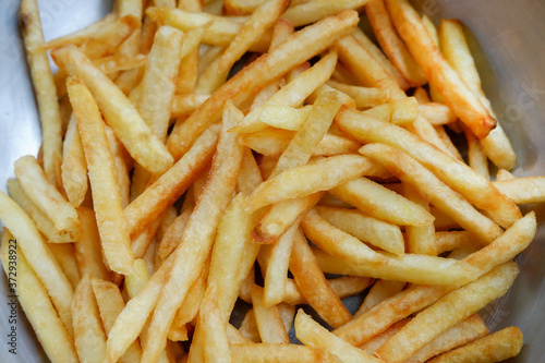 Close up french fries in bowl.