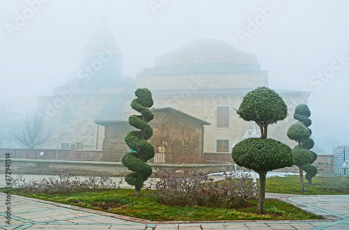 The trimmed trees in garden of Mevlana complex, Konya, Turkey photo