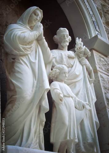 Holy Mary, child Jesus and Saint Joseph at the entrance of Saint Joseph in Nazareth, Israel