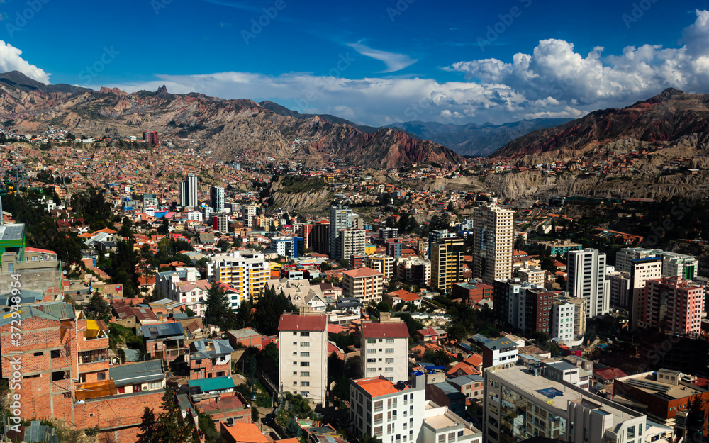 Aerial view of La Paz city, Bolivia,  with a beautiful landscape of Los Andes in the background from one of its cable cars