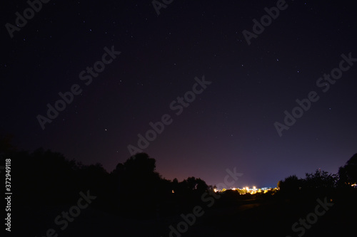Village at night with stars © Carlos