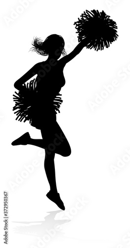 Sports cheerleader in silhouette with pompoms