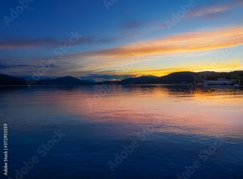 Beautiful view of the lakes at sunset in Klagenfurt in Austria.