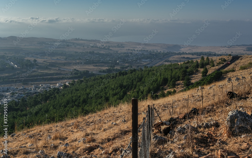 Early morning view of Hula Valley, Golon Heights with Mt. Hermon and the southern end of the Sea of Galilee as seen from Mitzpe Hayamin hotel, located in Upper Galilee, Israel.