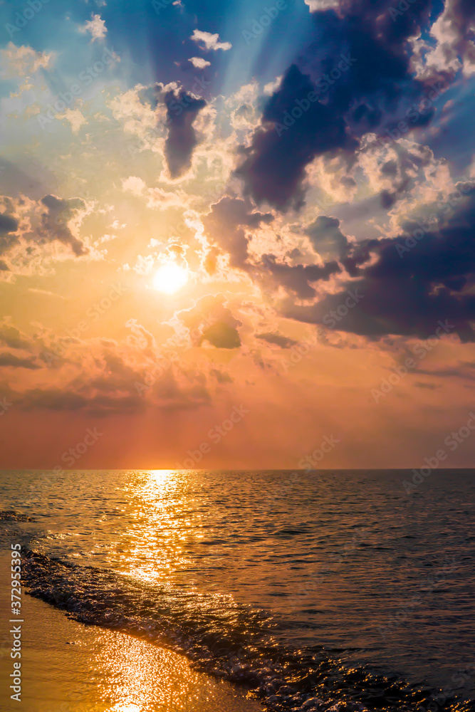 The concept of travel and rest at the seaside, sea waves on the background of the shoreline and sunset The concept of travel and rest at the seaside, sea waves on the background of the shoreline and sunset