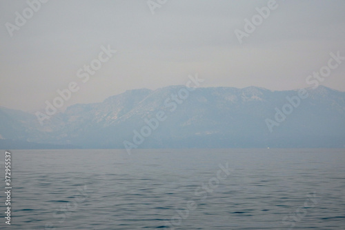 Smokey Skies Over Lake Tahoe with Shrouded Surrounding Western Sierras from Nevada Beach Nevada in from Wildfires of August 2020