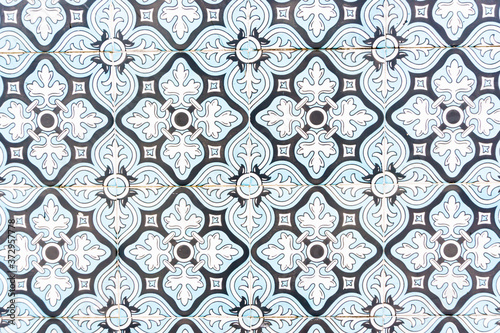 Vintage tiles with geometric borders in blue