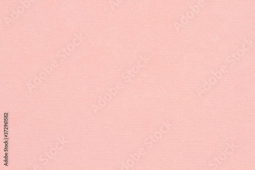 Light pink textured cardstock paper closeup background photo