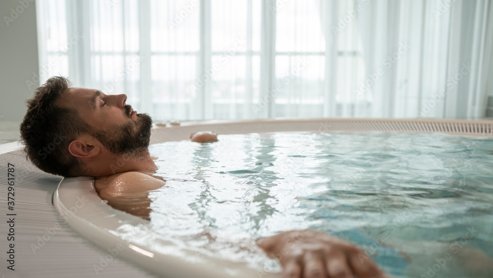 the guy is resting in the spa the guy is resting in the spa